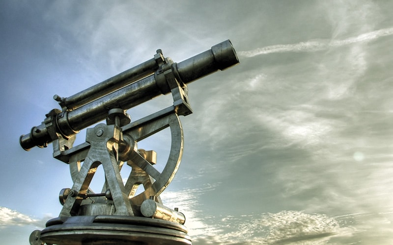 telescope with sky in the background